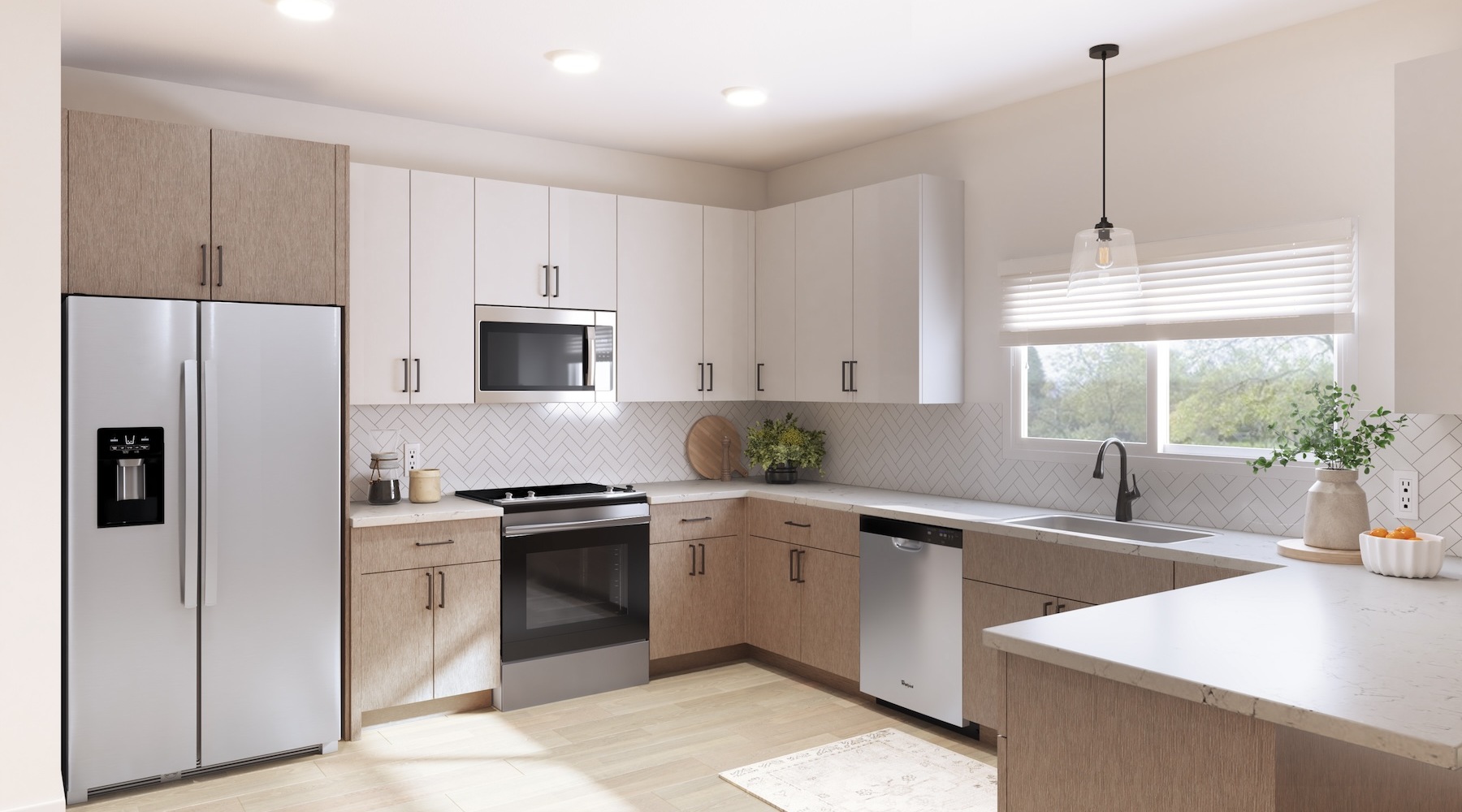 A brilliant new collection kitchen showing an island, bright lighting and modern appliances