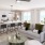 a living room with a large kitchen